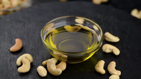 fresh made cashew oil on a rotating plate (seamless loopable)