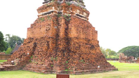 visitors admire ancient temple architecture in thailand