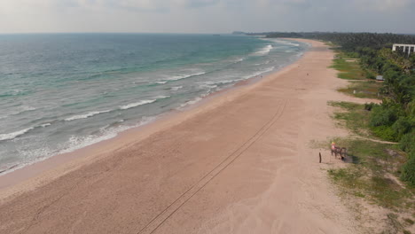 bentota beach in sri lanka by drone, travelling forward