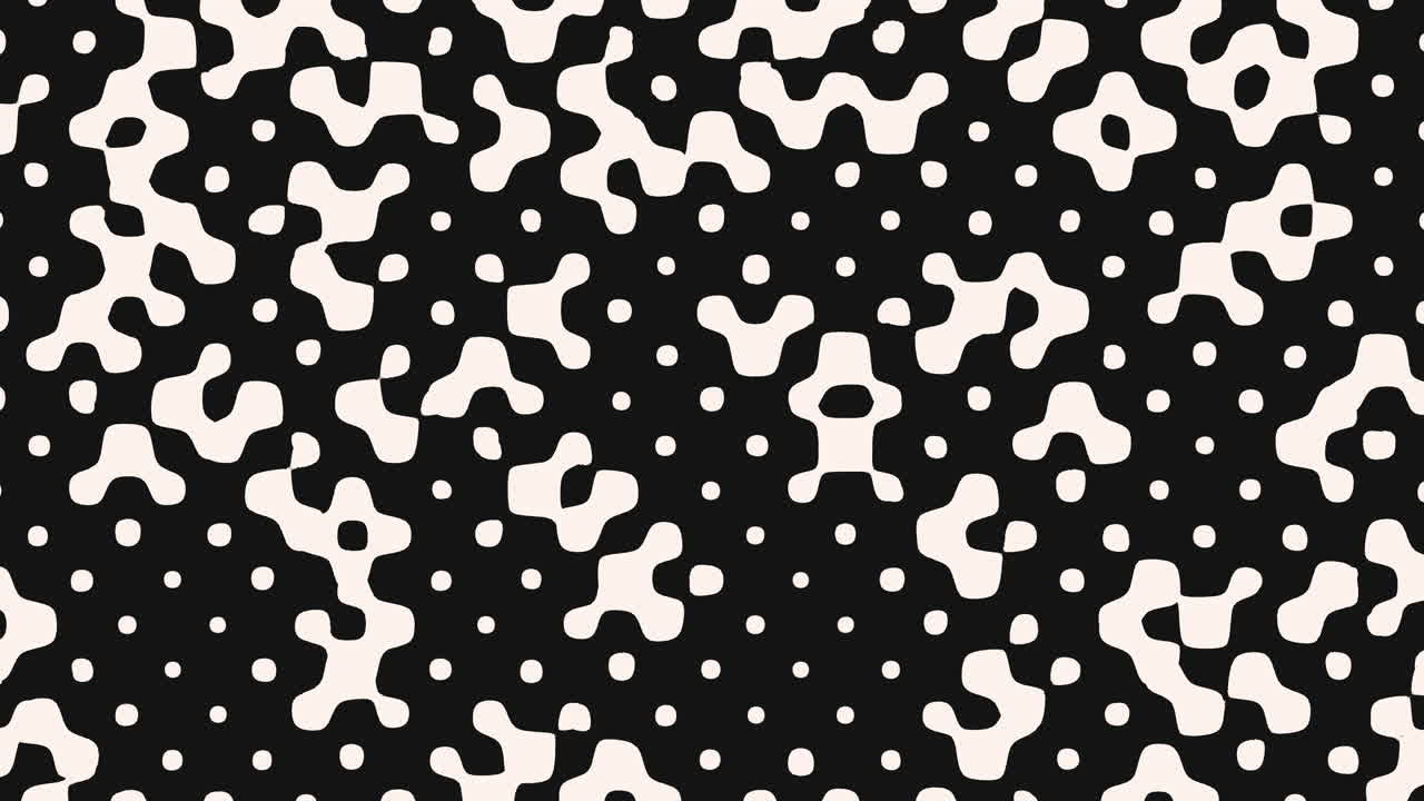 Abstract black and white dot pattern randomly arranged white dots on black background