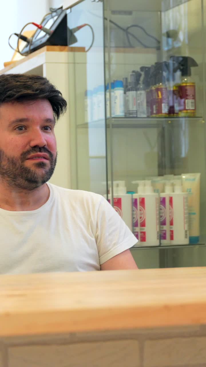 Man looking at himself in the mirror