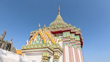 visitors explore wat pho temple in bangkok