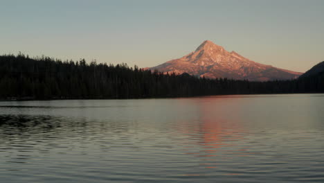 low aerial slider shot of mount hood from lost lake