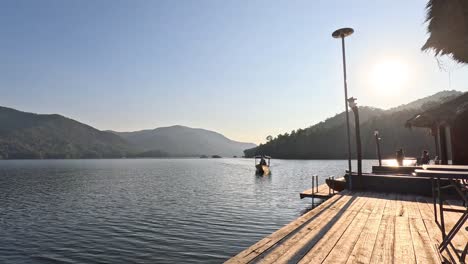 time-lapse of a tranquil dock scene at dusk