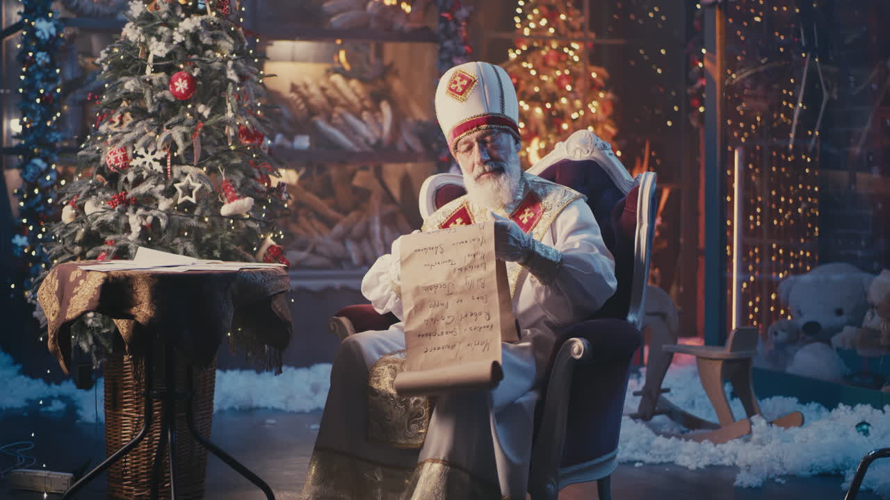 Sinterklaas checking his list in a festively decorated room