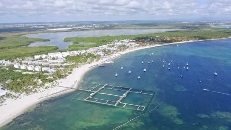 Scenic-Bavaro-Beach-And-Touristic-Resorts-Among-Lush-Landscape-With-Sight-Of-Dolphin-Explorer-Park,-Lanchas-Playa-And-Laguna-Bavaro-In-Punta-Cana,-Dominican-Republic