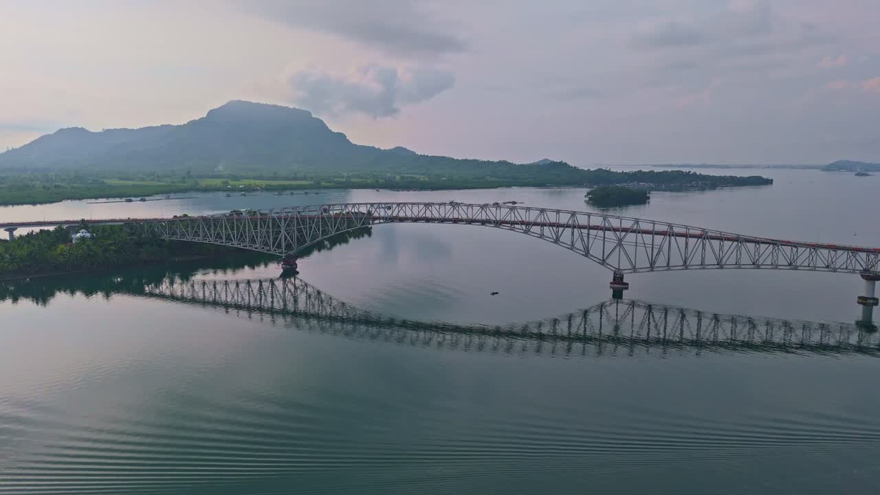 A stunning birds eye view from side of iconic San Juanico Bridge in Philippines, captured in cinematic detail alongside its full length from Samar to Leyte.