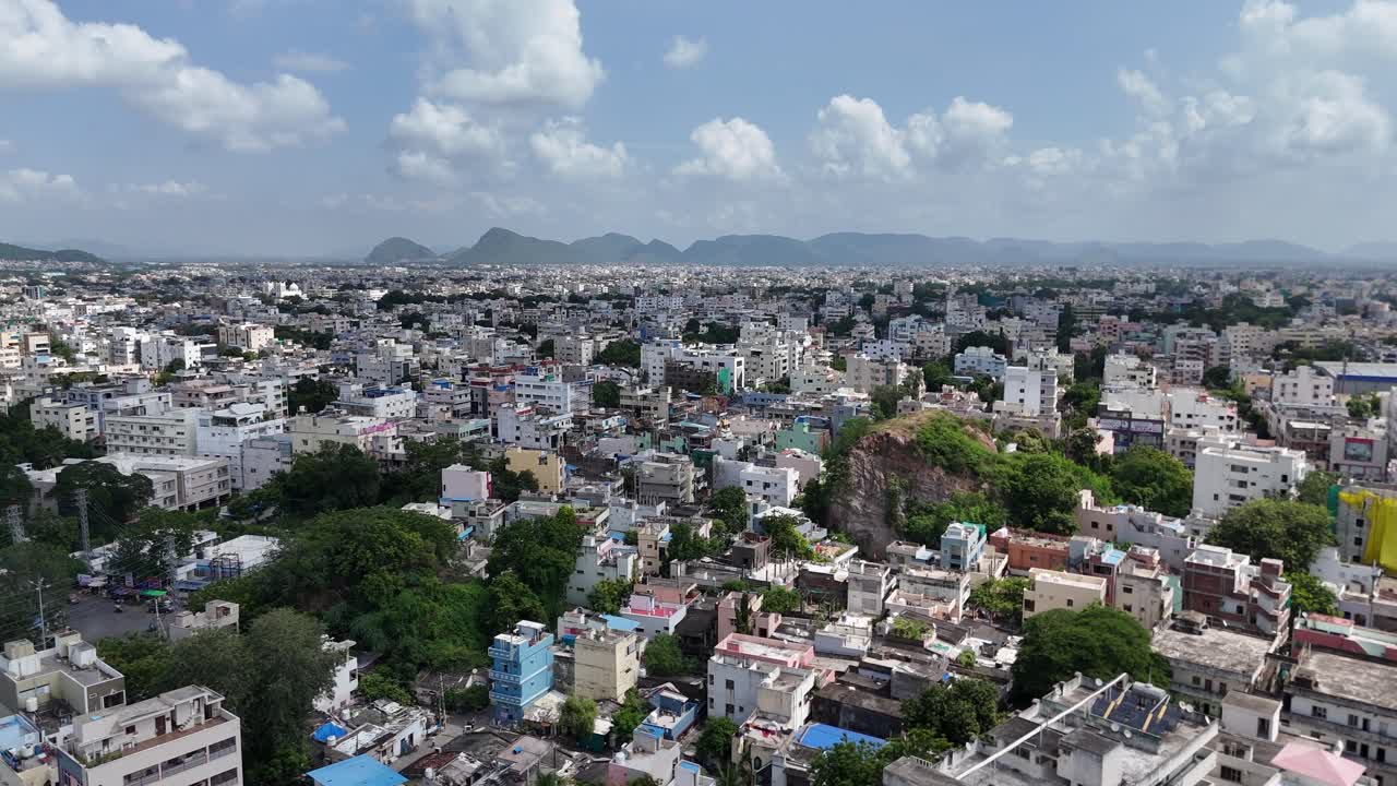 Vijayawada cityscape seen from above, capturing the blend of old and new architecture.