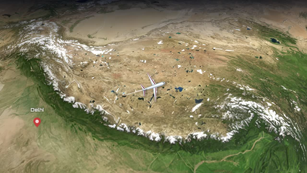 Un aereo commerciale sorvola una mappa satellitare da Delhi, India, a Tokyo, Giappone.