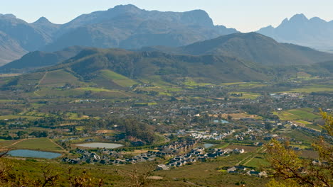 scenic location of franschhoek in wine valley surrounded by mountains, top view