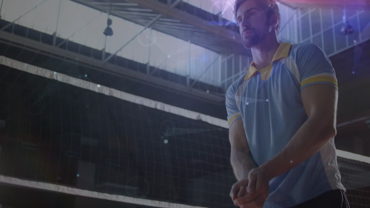 Man bumping volleyball in gym as ball drops, particles, flares tracing arc preparing next play