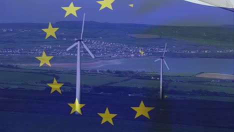 animation of european union flag over rotating wind turbines in field