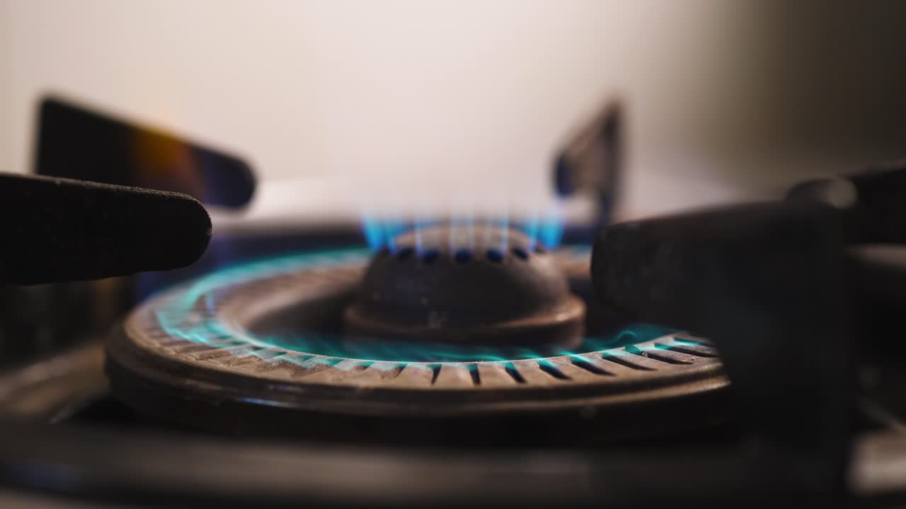 Close-up, gas appliances, kitchen cooking equipment, blue flame energy