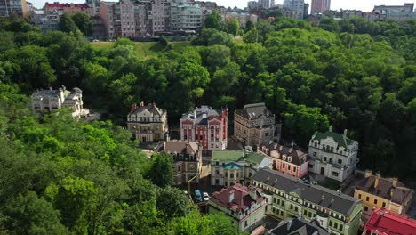 aerial view of a charming european city with colorful buildings and lush green areas