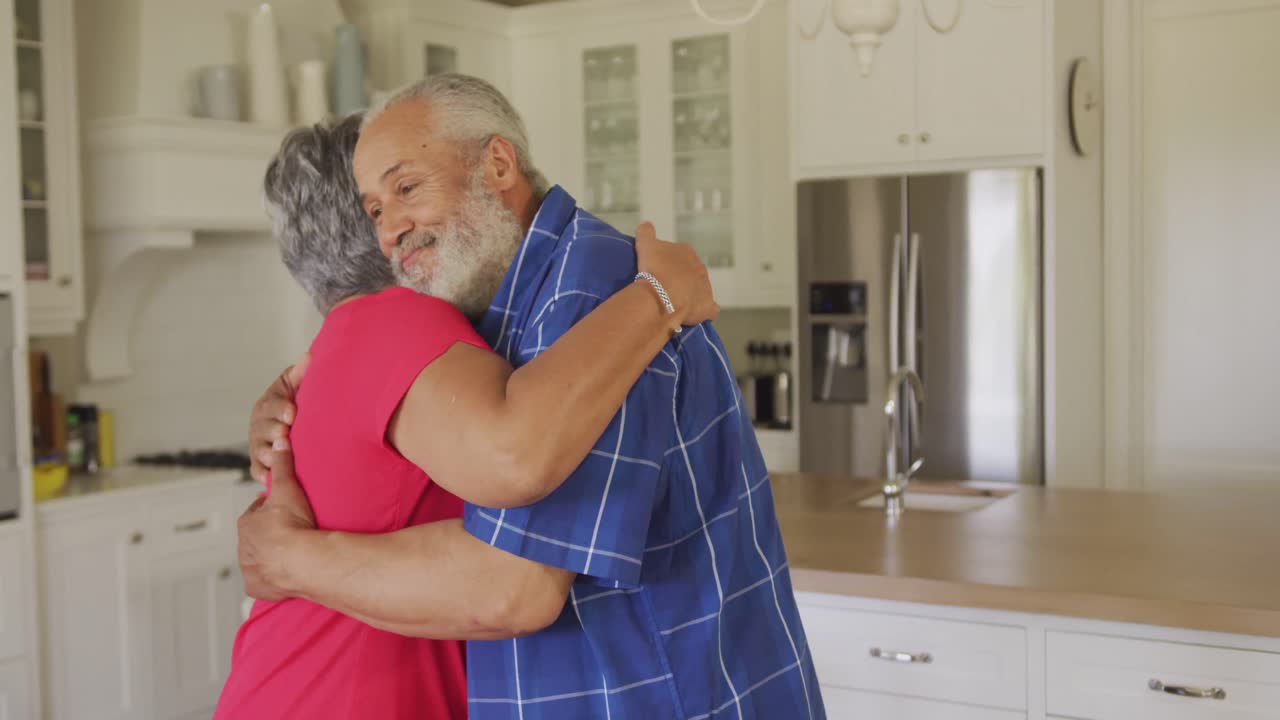 An African American senior couple spending time at home together