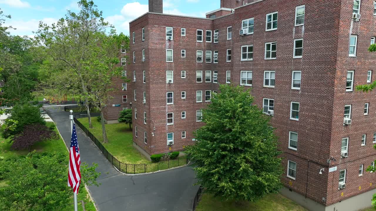Aerial view of apartment block with american flag on Staten Island, New York City