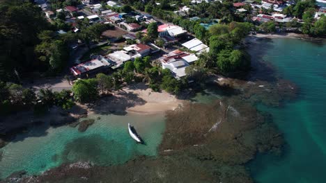 aerial view of puerto viejo de talamanca, costa rica, idyllic coastal caribbean village, revealing drone shot