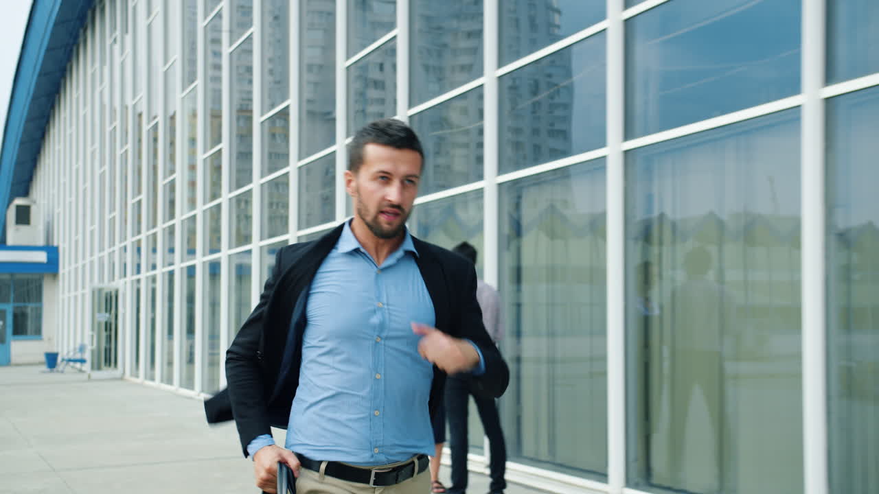 Businessman running to a meeting