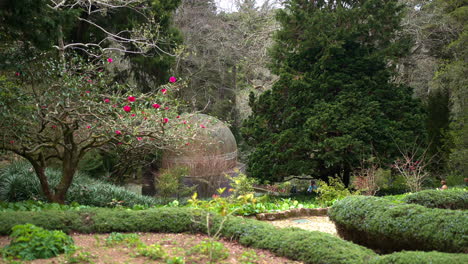 park with a dome and flowers