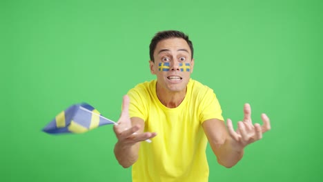 Man Cheering for Sweden, angry with the decision of referee
