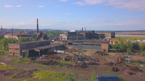 abandoned industrial complex with demolition and scrap metal