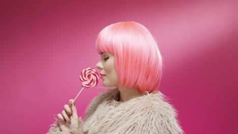 Close-Up-Of-A-Beautiful-Woman-Wearing-A-Pink-Wig-And-Turning-Her-Face-To-The-Camera