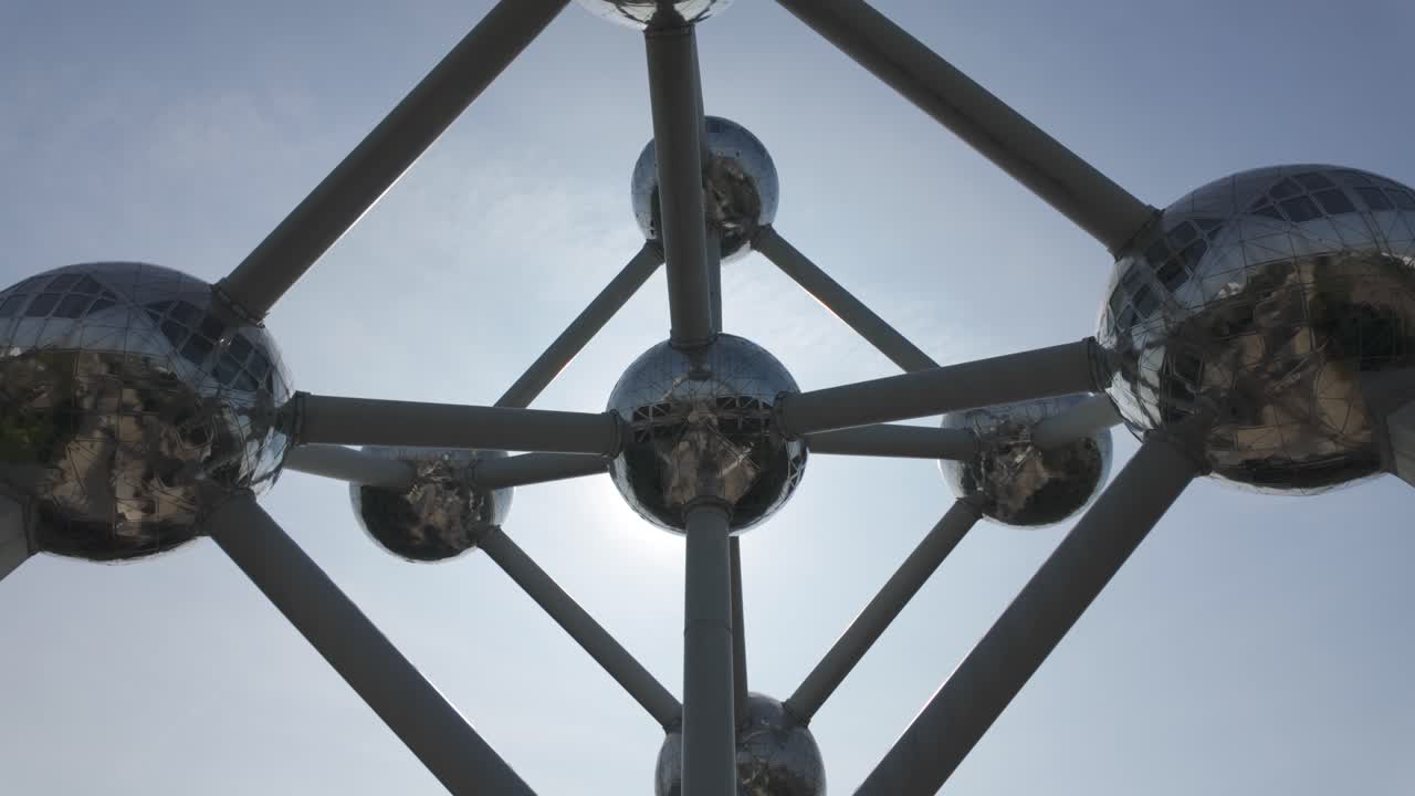 A close up view of the iconic Atomium structure in Brussels, showcasing its metallic spheres and framework