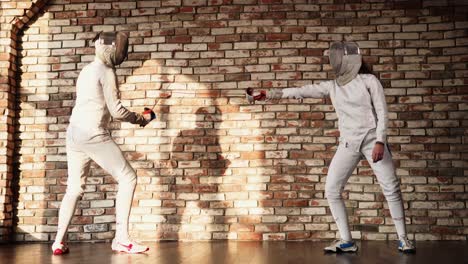 two women fencing