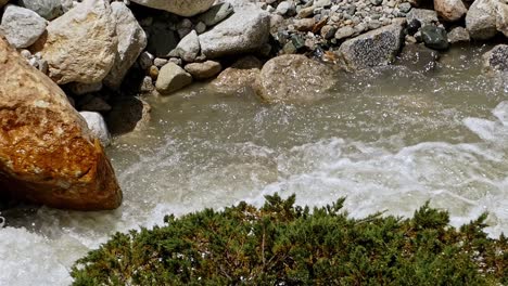 Beautiful-cinematic-shot-of-rive-ganges-gushing-down-the-steam-from-the-origin-in-uttarkhand-region-of-india