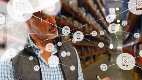 animation of network of connections over man working in warehouse