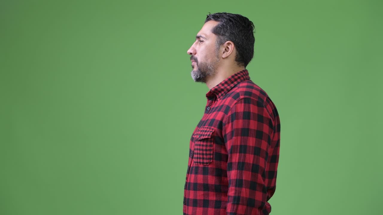 Profile view of handsome Persian bearded man