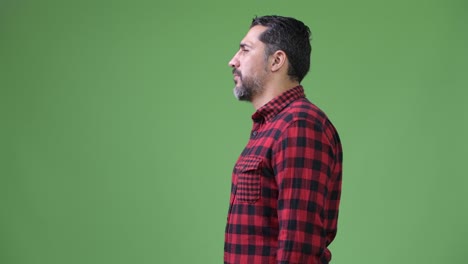 profile view of handsome persian bearded man