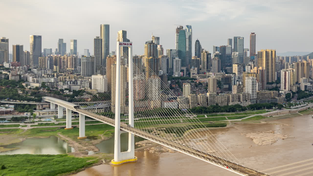 Timelapse of the amazing Chongqing cyberpunk city skyline from a high vantage point wirh the yangtze river