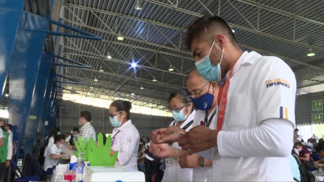 three-medics-preparing-covid-19-vaccine-in-Mexico-city