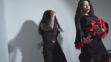 two women in halloween costumes dancing
