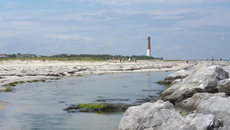 People-enjoying-the-rocky-jetty-at-the-Barnegat-Lighthouse