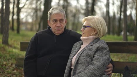 senior couple on a park bench