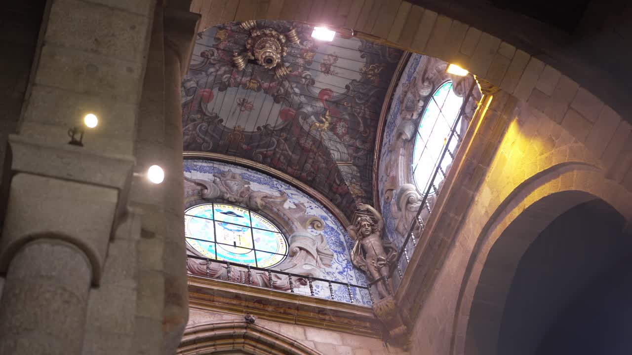 Ornate Church Interior with Vaulted Ceiling and Stained Glass