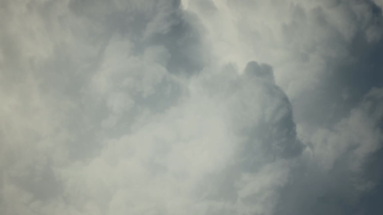Timelapse video capturing the rapid movement of dark rain clouds across the sky