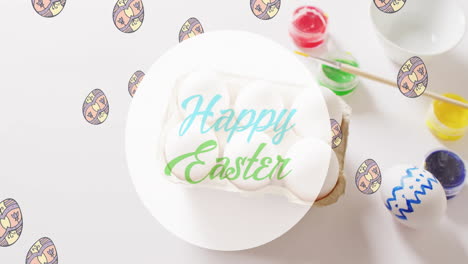 animation of happy easter text over eggs and paints on white background