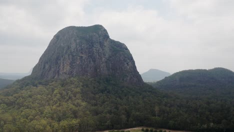 Aerial-View-Of-Mount-Tibrogargan-In-The-Glass-House-Mountains-National-Park-On-Sunshine-Coast,-Queensland,-Australia---drone-shot