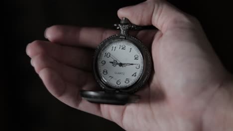 Close-up-on-Male-Hand-Pushing-Latch-Release-to-Open-Vintage-Pocket-Watch-with-Transparent-Glass,-4K