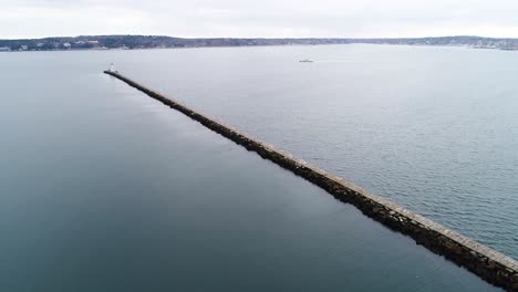 Birds-eye-view-of-the-stone-bridgeway-to-the-Rockland-Breakwater-Lighthouse-in-Maine