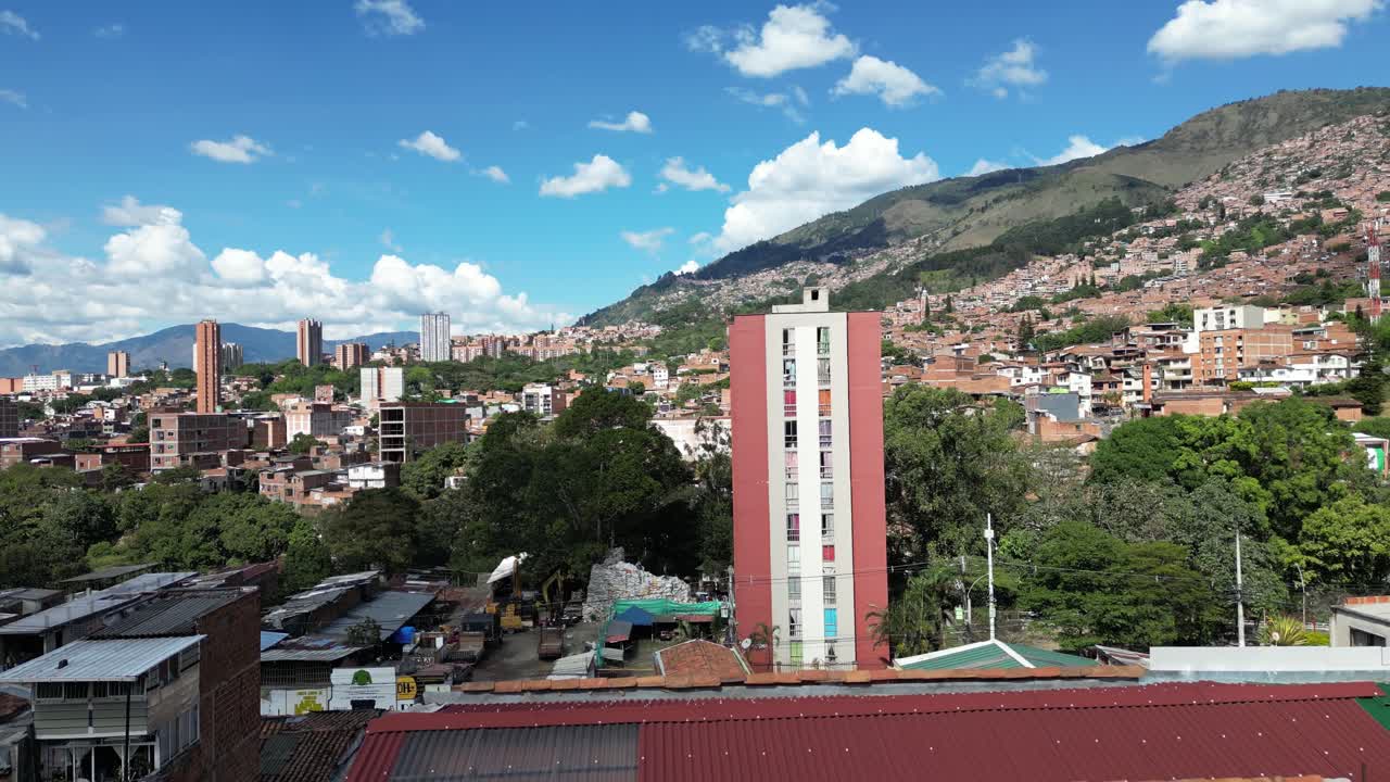 Experience Medellín, Colombia, through an aerial view capturing its vibrant cityscape, surrounded by the majestic Andes Mountains and lush greenery. Perfect for cultural and travel-focused projects.