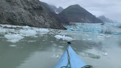 kayaking through icy glacier field