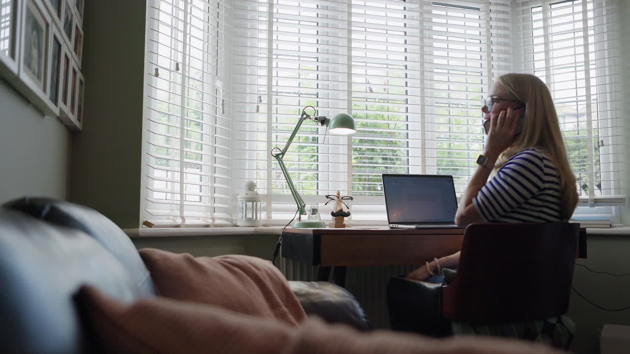 A woman working from home in her office
