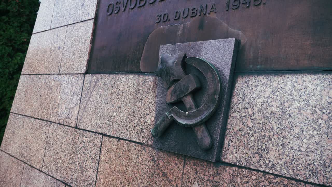 Soviet Star with communist hammer and sickle symbol on city war memorial