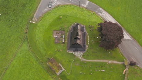 aerial view, hopperstad stave church and graveyard, norway