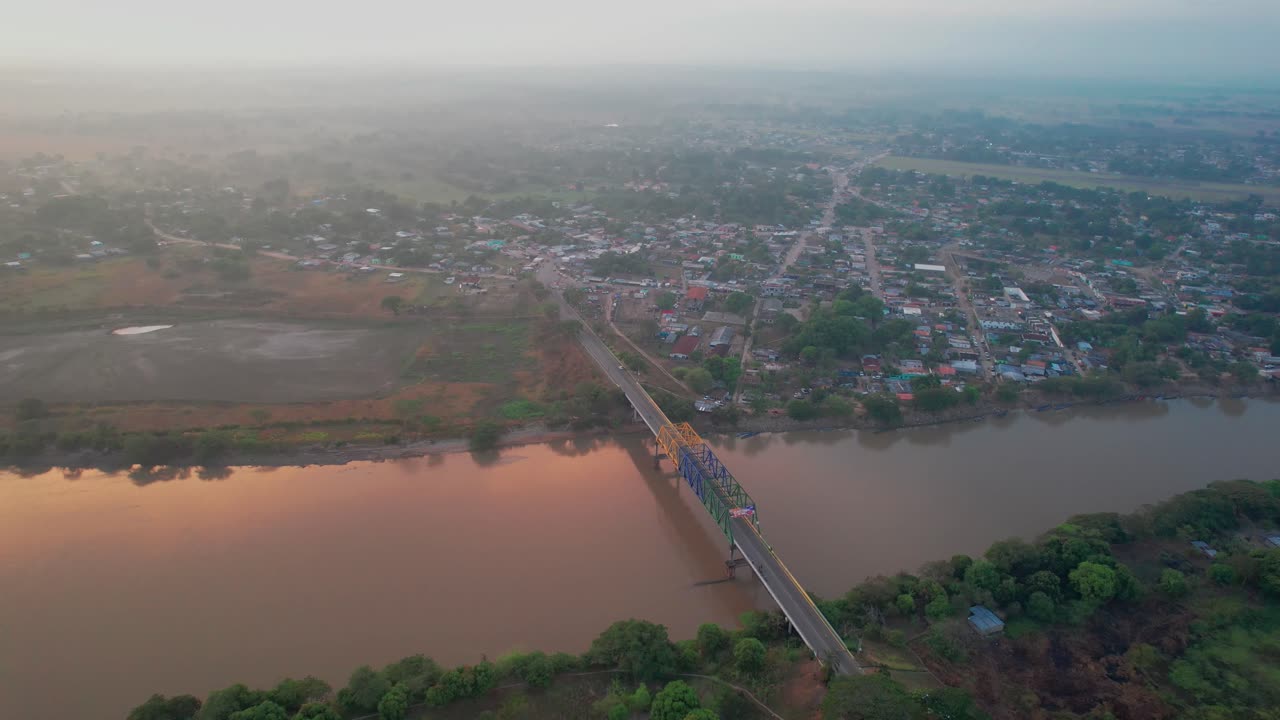 Aerial view of Elorza, Apure, revealing lush greenery and a calm river