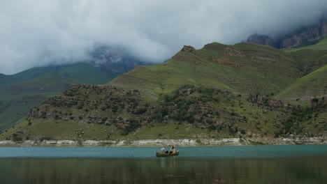 couple canoeing on a mountain lake